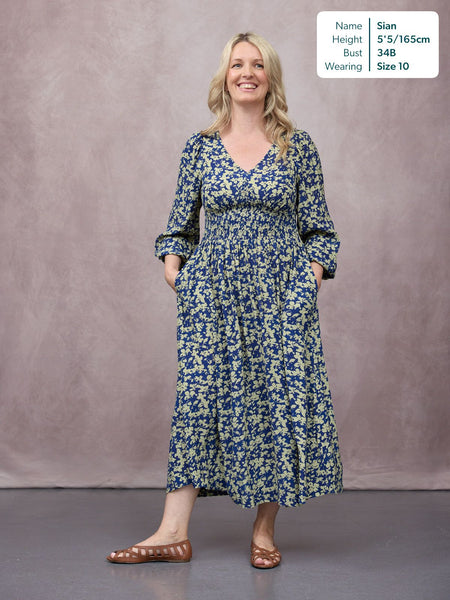 unfolded-maddie-long-sleeve-dress-navy-green-leaf-print-69870682014080_OVERLAY.jpg