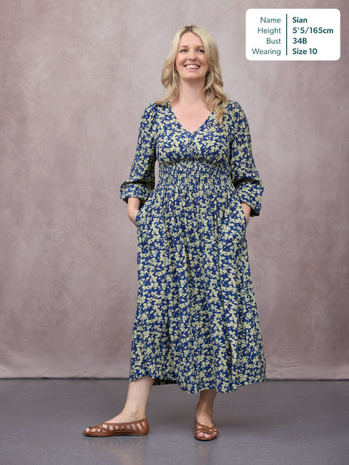 unfolded-maddie-long-sleeve-dress-navy-green-leaf-print-69870682014080_OVERLAY.jpg