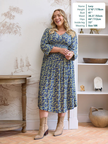 unfolded-maddie-long-sleeve-dress-navy-green-leaf-print-69871623897472_OVERLAY.jpg