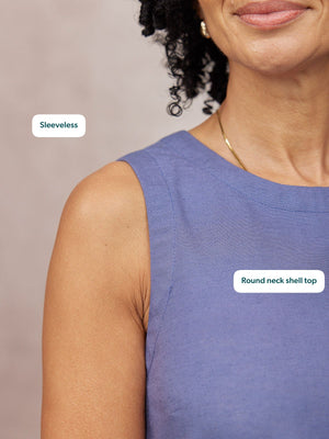 Co-Ord Embroidered Shell Top in blue, sleeveless round neckline, worn by a woman with curly hair on a neutral background.