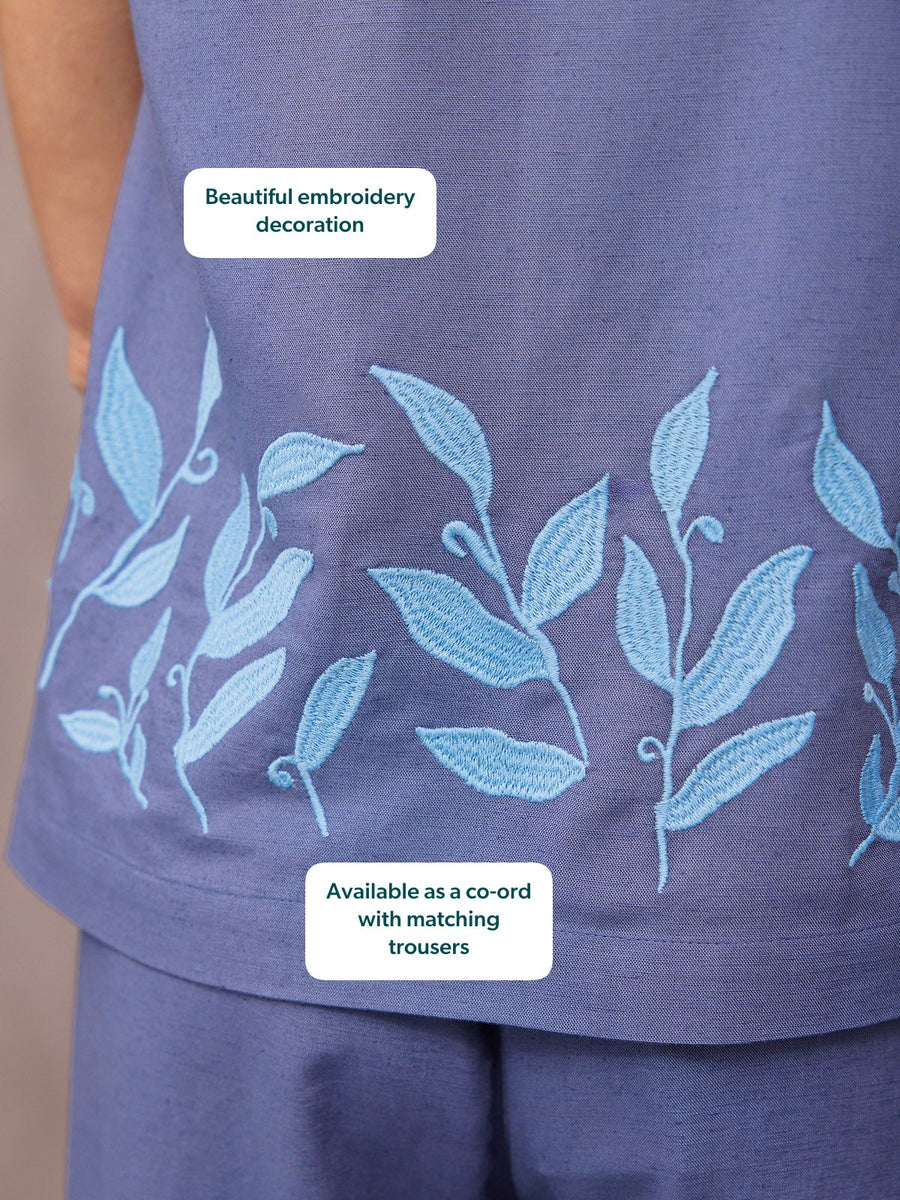 Violet & Verity Blue Co-Ord Embroidered Top close-up showing light blue botanical leaf embroidery along hem