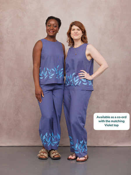Two women wearing blue Violet & Verity Co-Ord Bundle — sleeveless tops and matching trousers with blue leaf embroidery