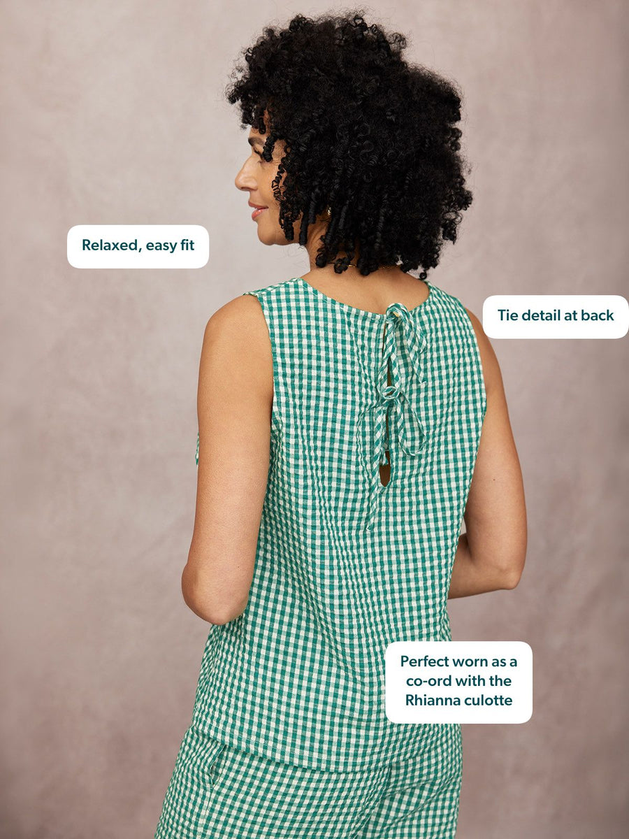 Ruby Tank Top in green gingham, rear view showing tie detail at back neckline, relaxed fit, worn by model against neutral