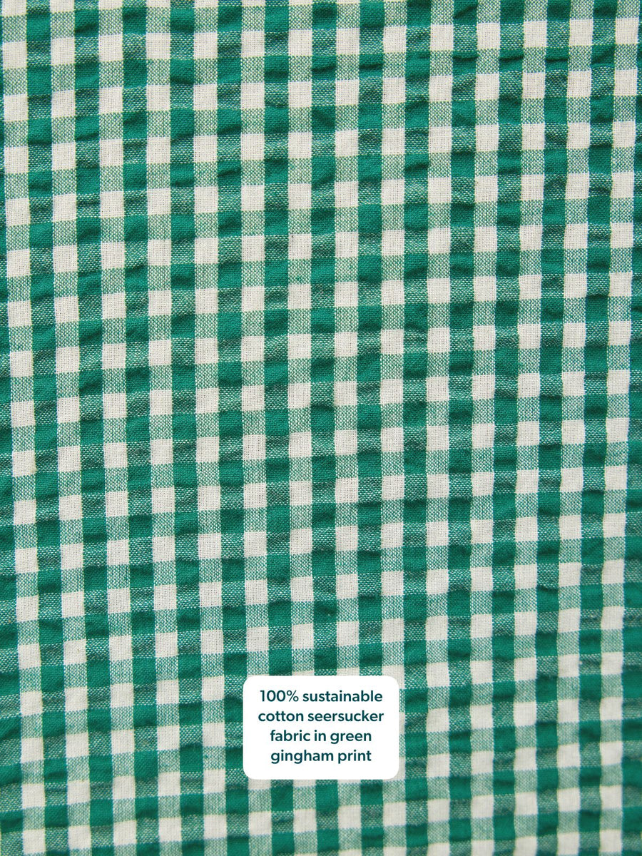 Close-up of Ruby Tank Top fabric in green and white gingham seersucker cotton with a textured crinkle finish.