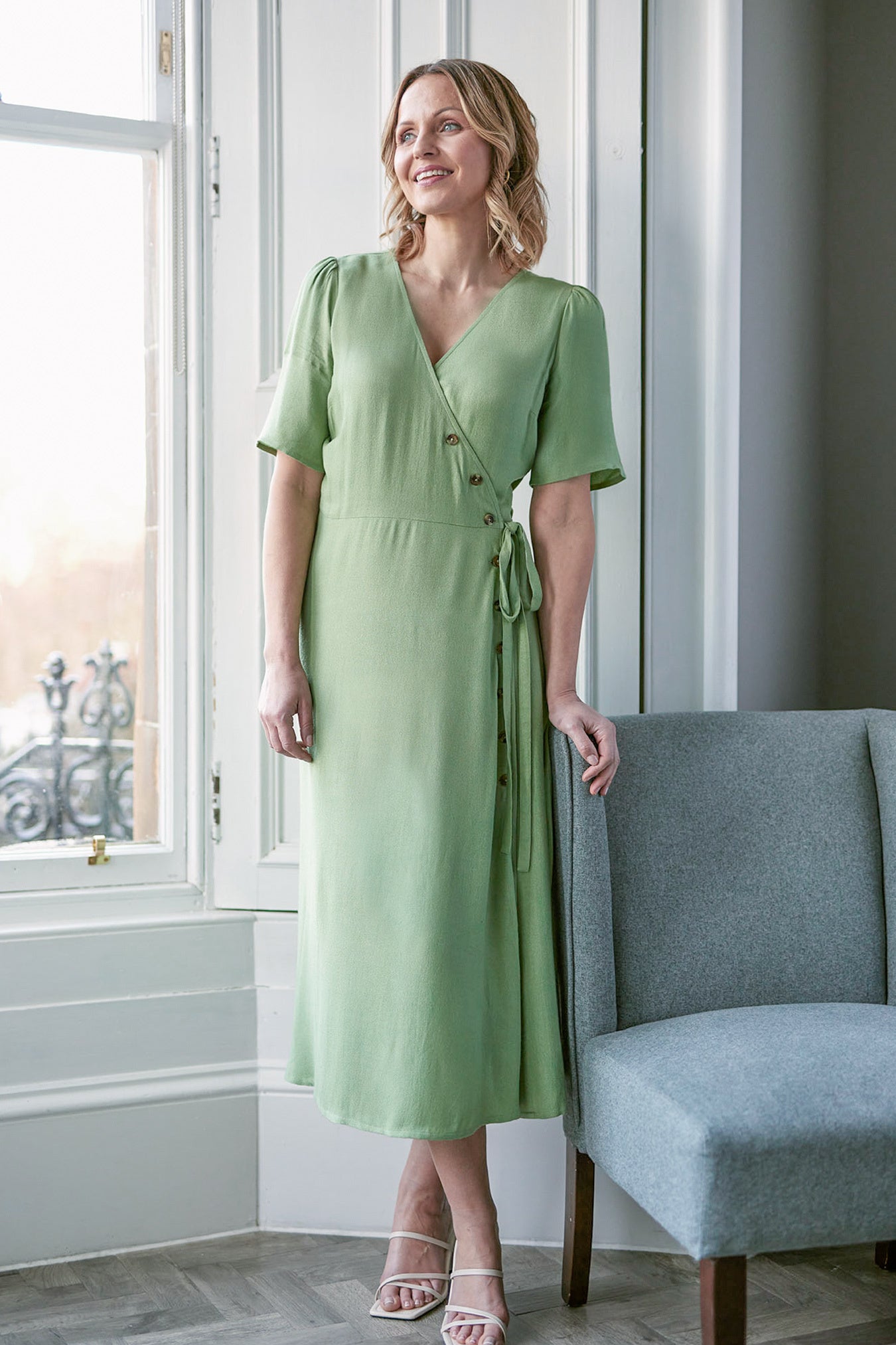 Green dress with buttons best sale